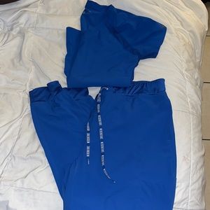 Med couture peaches royal blue scrub set